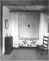 SA0679b - Photo shows a bed in the home owned by Edward D. and Faith Andrews in Richmond, MA., Winterthur Shaker Photograph and Post Card Collection 1851 to 1921c